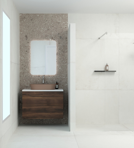 Stijlvolle badkamer met donker houten meubel, roze waskom en terrazzo achterwand