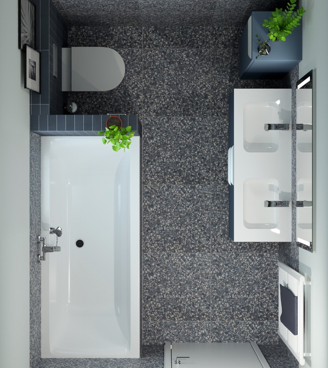 Vue de dessus d’une petite salle de bain avec baignoire, double vasque et WC suspendu, intelligemment agencée pour une utilisation optimale de l’espace.